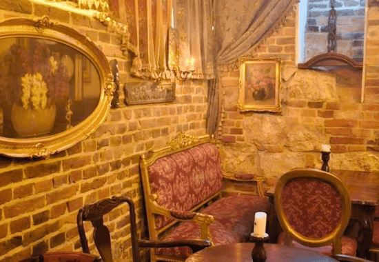 Candlelit interior at Mythos, Krakow