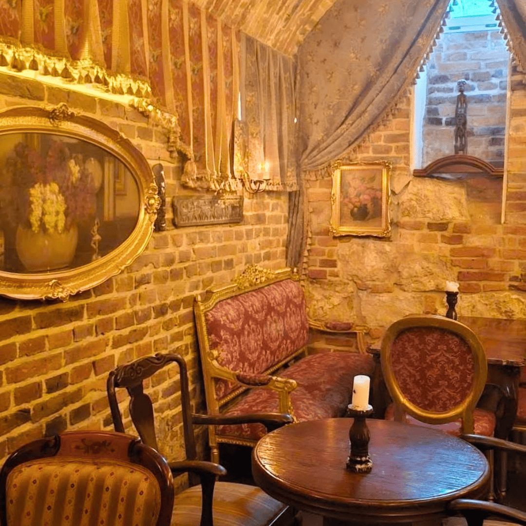 Candlelit interior at Mythos, Krakow