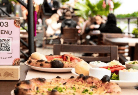 Pink pizza at Bottomless Drag Brunch, Krakow