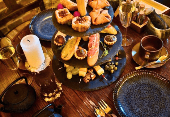 Prosecco and shared plates, alchemist's afternoon tea Krakow