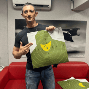 Guest celebrating a good target result, Krakow shooting range