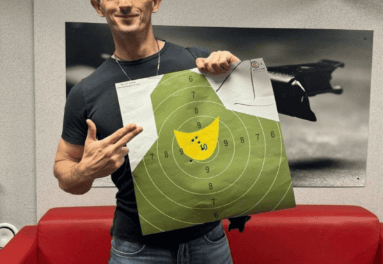 Guest celebrating a good target result, Krakow shooting range